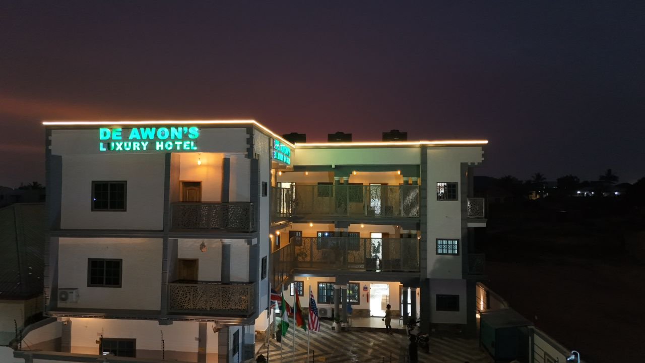 De Awon's Luxury Hotel illuminated at dusk